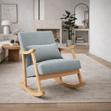 Chaise à bascule pour allaitement en tissu beige, confortable et élégante, idéale pour les moments de soin et de détente.