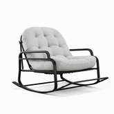 Fauteuil à bascule design Cazamoon.com en tissu gris clair, avec structure en bois élégant et coussin confortable.