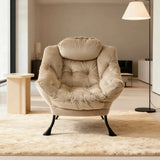 Fauteuil design beige avec repose-pied