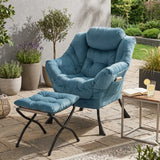 Fauteuil design bleu avec repose-pied