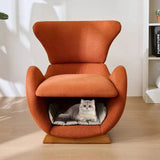 Fauteuil design orange avec niche intégrée pour chat, confortable et moderne, idéal pour la détente de votre animal.