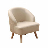Fauteuil pour enfant chic beige de la marque Cazamoon.com, avec design élégant et confortable pour la chambre d'enfant.