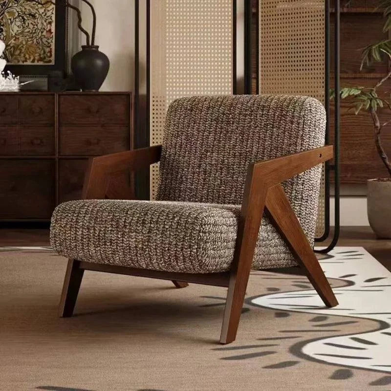 Fauteuil individuel en tissu avec cadre en bois