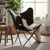 Fauteuil papillon en cuir de vachette