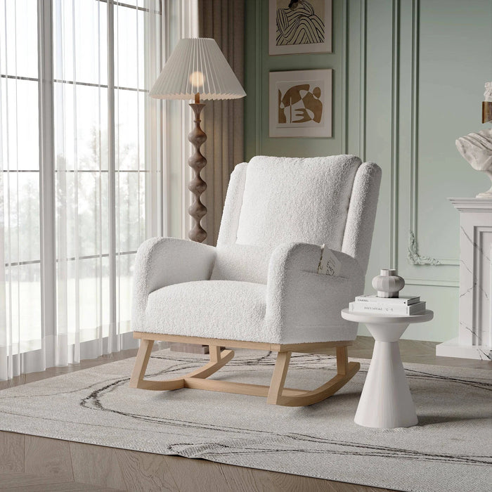 Fauteuil relax à bascule blanc en tissu, confortable et moderne, idéal pour la détente à la maison.