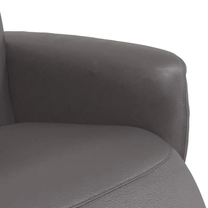Chaise ergonomique grise en synthétique avec repose-pieds, design facile à nettoyer, style moderne et confortable.
