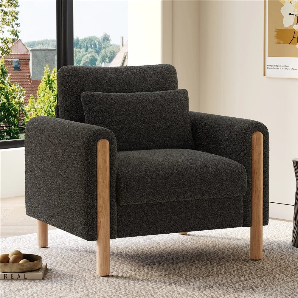 Fauteuil moderne confortable avec coussin épais et tissu doux, fauteuil simple pour se détendre dans le salon.
