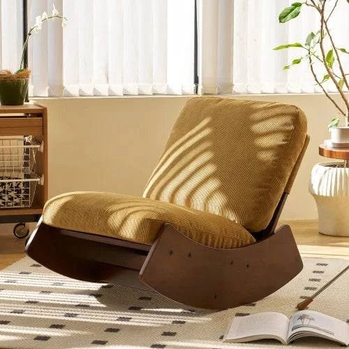 Fauteuil à bascule design contemporain jaune, moderne et élégant, avec structure en bois et coussin rembourré pour le confort.