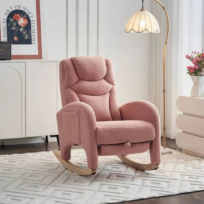 Fauteuil à bascule design rose de Cazamoon.com, assise confortable avec structure en bois et coussin rembourré.