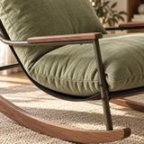 Fauteuil à bascule vert en velours 