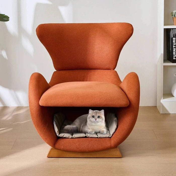 Fauteuil design orange avec niche intégrée pour chat, confortable et moderne, idéal pour la détente de votre animal.