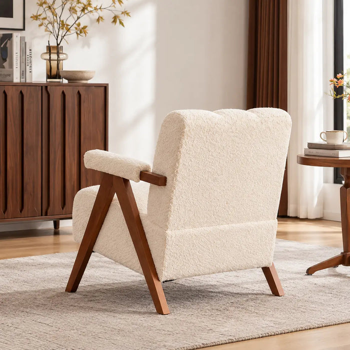 Fauteuil en tissu bouclette et bois design