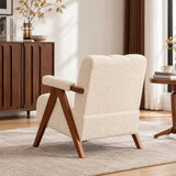 Fauteuil en tissu bouclette et bois design