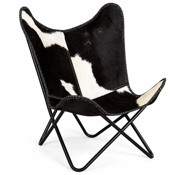 Fauteuil papillon en cuir de vachette 